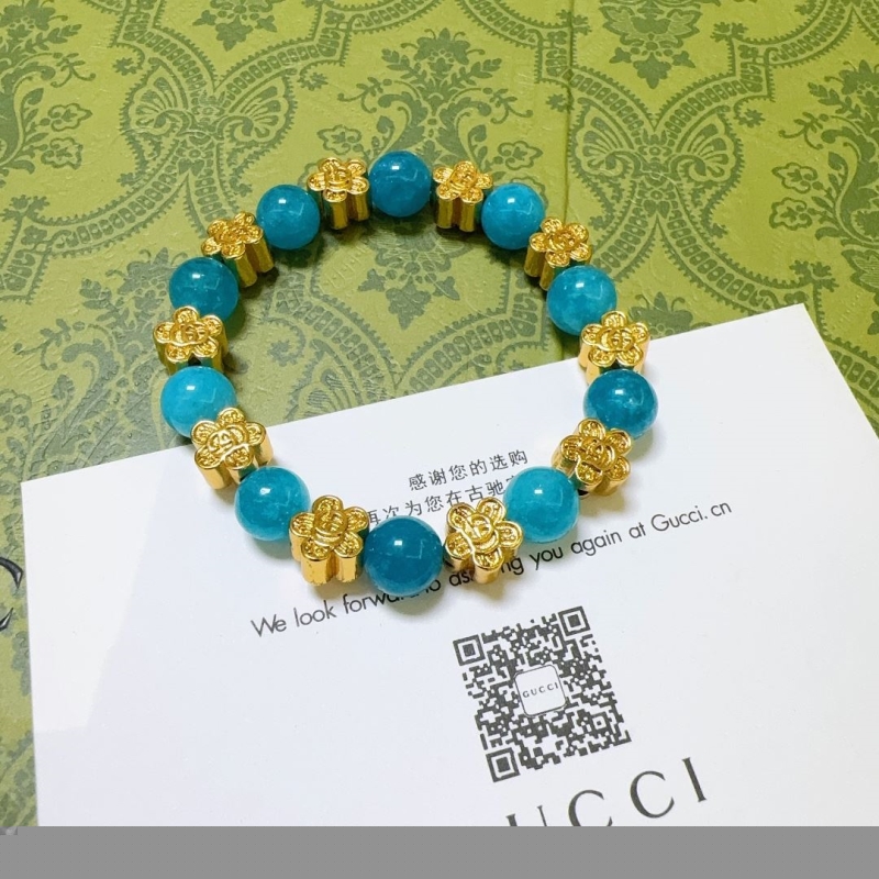 G*u*i bracelets